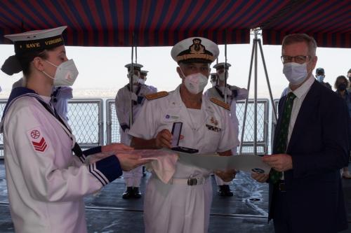 HE Ambassador Aiden O’Hara, HoD of the EU in Djibouti, is awarded by RAdm Paolo Spagnoletta, EUNAVFOR Atalanta DCOM.