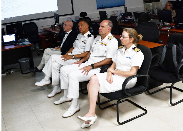 OPCDR and AGENOR Force Commander attending a presentation