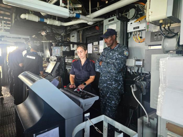 ATALANTA flagship SANTA MARIA crewmember briefing to a Djiboutian Navy trainee 