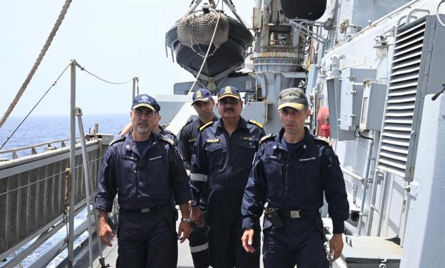 EU NAVFOR Force Commander, Rear Admiral Fabrizio Rutteri, Flag Officer of the Western Indian Fleet, Rear Admiral Vineet McCarty, and DURAND DE LA PENNE’s Commanding Officer, Captain Marco Podico, on board the ITS DURAND DE LA PENNE (Front line, l to r).